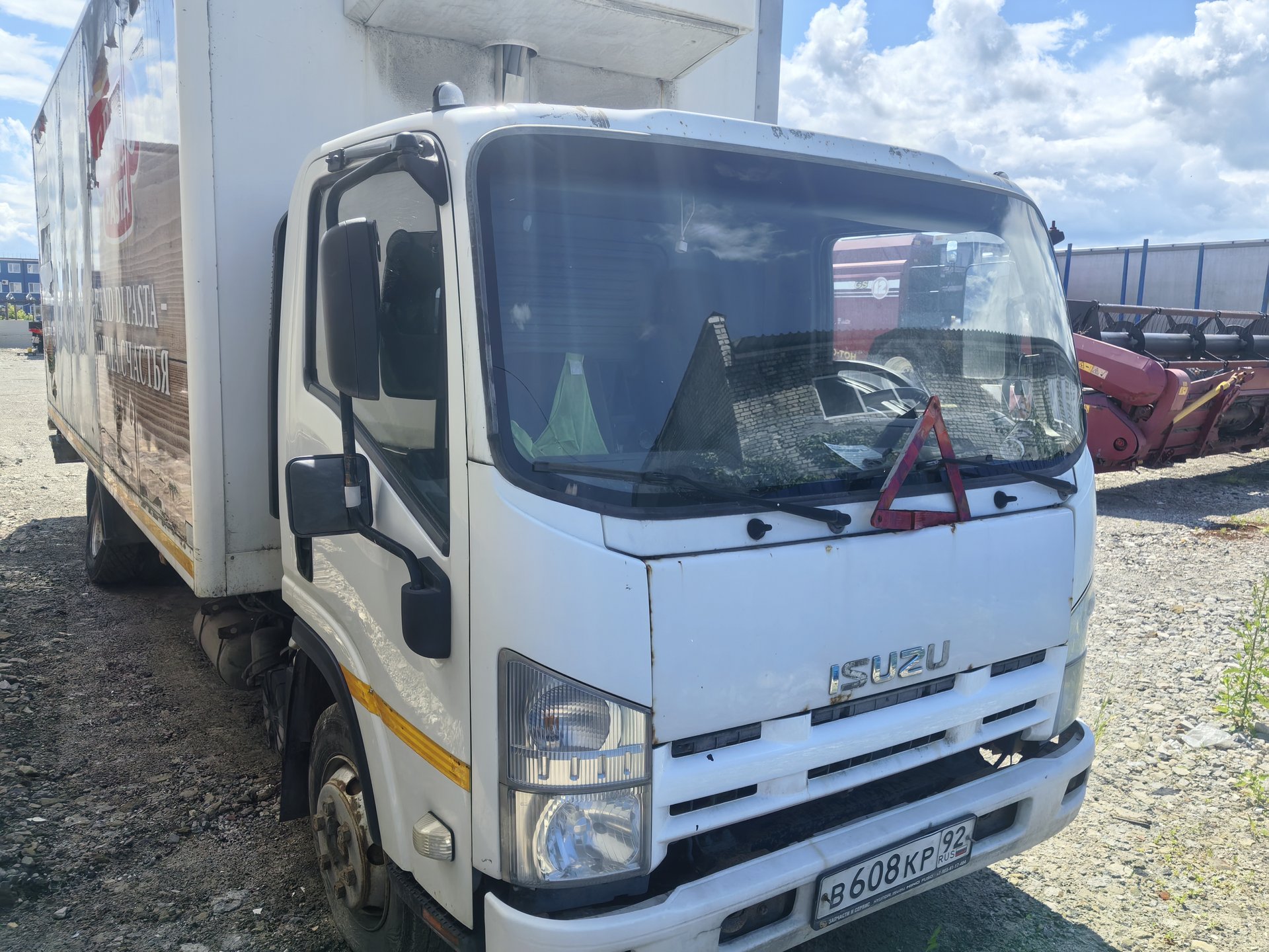 Isuzu ELF 9.5 (NQR) Изотермический/рефрижератор с гидробортом — Дзержинск