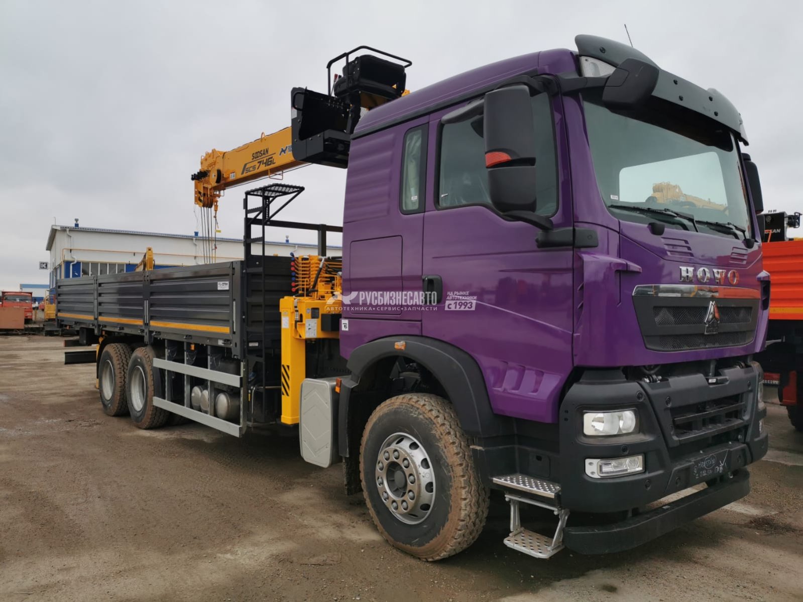 КМУ HOWO T5G (6x4, 400л.с., Евро-5) + SOOSAN SCS746L верх.упр. + борт сталь 8,0м. СПМ — новая техника в лизинг