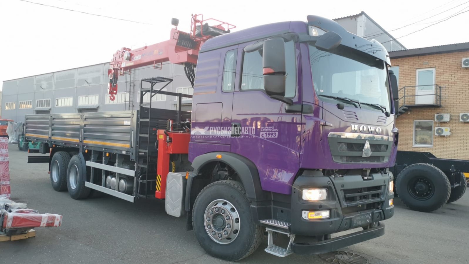 КМУ HOWO T5G (6x4, 400л.с., Евро-5) + HANGLIM KS1256G2 верх.упр. + борт сталь 8,0м. СПМ — новая техника в лизинг