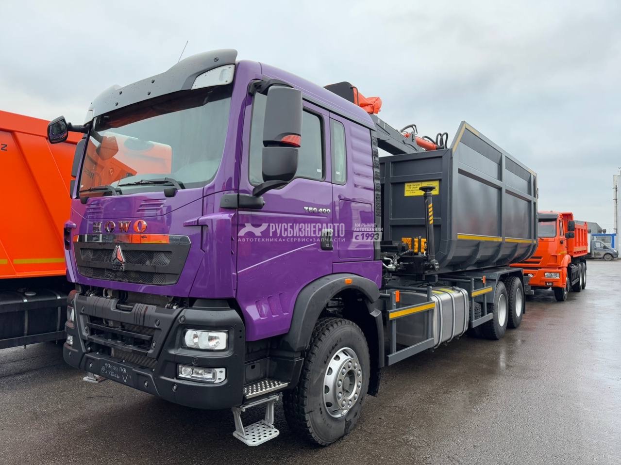 КМУ Ломовоз HOWO T5G ZZ1257V534GE1 (6x4, 400л.с., кузов Half-Pipe 32 куб., Р97-04М, захват ГЛ-6М — новая техника в лизинг